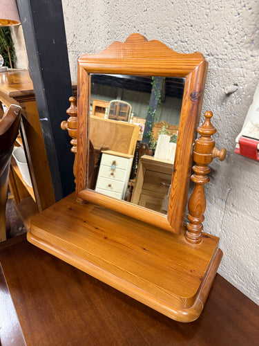 This charming solid pine dressing table mirror is sturdy and in great overall shape. While it shows some signs of use, the marks are minimal and don’t detract from its appeal. It’s an ideal companion for your chest of drawers.

Delivery Available

Overall Dimensions

approx : 49cm wide x 23cm deep x 56cm high     

