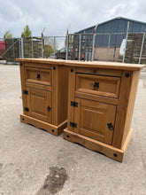 Load image into Gallery viewer, Constructed with durable solid pine, these two bedsides are in great condition and offer ample storage with 1 drawer and 1 cupboard each. Despite some minor wear from previous use, they are still in sturdy and good condition.

Overall Dimensions

53cm wide x 38.5cm deep x 67cm high

DELIVERY AVAILABLE      

HAVE THIS PAINTED A COLOUR OF YOUR CHOICE FOR AN EXTRA £70 OR HAVE IT COMPLETELY STRIPPED BACK FOR JUST £80    

For our other items see our website https://fossewayfurniture.co.uk

collection from our 
