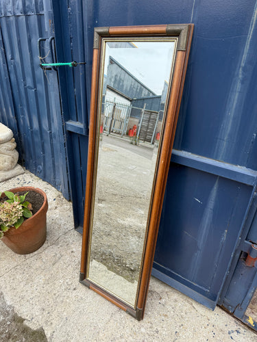 This gorgeous full-length mirror with a bevelled edge is sturdy and generally well maintained. It’s pre-loved, showing a few minor marks, but nothing significant. Equipped with a hanging wire on the back, it’s easy to mount and brighten up any space.

Delivery Available

Overall Dimensions

40cm wide x 126cm high 
