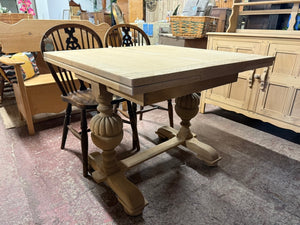 This beautiful oak extendable table has been fully restored to its natural finish and will need a wax coat to protect it. It extends effortlessly to accommodate 6-8 guests, making it ideal for entertaining. The tabletop separates from the base for easier transport. Structurally solid and in good condition overall , the only flaw is it has a minor veneer lift on the top but that can be easily fixed.

Overall Dimensions

91cm wide x 91cm deep x 74cm high

each leaf is an extra 30cm wide (60cm total when exten