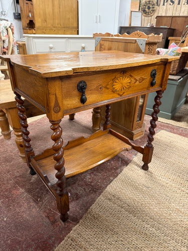 This beautiful early 20th century mahogany desk features intricate inlay and a shaped lift-up top that uncovers plenty of storage space. It rests on elegant barley twist legs. Though it shows some signs of use, the marks are minor and don’t detract from its charm.

Overall Dimensions

74cm wide x 49.5cm deep x 72cm high

DELIVERY AVAILABLE      

For our other items see our website https://fossewayfurniture.co.uk

collection from our shop at cv36, our collection zone at bs36 or otherwise delivery is availab