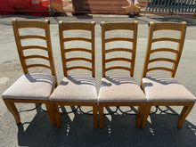 Load image into Gallery viewer, A set of four dining chairs, believed to be Barker &amp; Stonehouse design. Each chair displays the patina of age with minor surface marks that enhance their vintage appeal. Perfect for adding established character and quality craftsmanship to any dining space. Available to view in store with delivery options available.

Delivery Available

Overall Dimensions

approx : 50cm wide x 43cm deep x 111cm high

