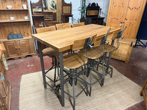 Bring authentic industrial charm into your dining space with this remarkable six-piece set. Featuring a robust table paired with six height-adjustable stools, it's an ideal choice for creating that coveted rustic aesthetic. Each piece carries character marks that speak to its history, adding genuine patina to your interior. Whether you're furnishing a kitchen, bar area, or casual dining zone, this collection delivers bold style with practical functionality that works beautifully in contemporary and traditio
