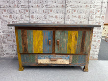 Load image into Gallery viewer, This beautiful solid boat wood sideboard is sturdy and well-maintained. While it shows some signs of use, the marks are minor. It features a double cupboard and a single drawer, offering plenty of storage space. This is sure to be the focal point of any room.

Overall Dimensions

140cm wide x 50.5cm deep x 85cm high

DELIVERY AVAILABLE      

For our other items see our website https://fossewayfurniture.co.uk

collection from our shop at cv36, our collection zone at bs36 or otherwise delivery is available

