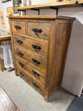Load image into Gallery viewer, Crafted from solid wood, this rustic chest of drawers combines timeless character with practical storage. Featuring two shallow drawers above four generous compartments, it offers versatile space for bedroom essentials or living room organisation. The rustic finish and authentic patina add charm to any interior, while its sturdy construction ensures lasting durability. A classic piece that brings warmth and functionality to your home.

Delivery Available

Overall Dimensions

100cm wide x 50.5cm deep x 91cm 
