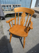 Load image into Gallery viewer, This charming farmhouse solid pine carver chair is sturdy and well-maintained. While it shows some light signs of use, these minor marks don’t detract from its appeal. It’s an ideal choice for the head of your dining table or a cozy spot by the fire.

Overall Dimensions

approx : 56cm wide x 42cm deep x 92cm high

DELIVERY AVAILABLE      

For our other items see our website https://fossewayfurniture.co.uk

collection from our shop at cv36, our collection zone at bs36 or otherwise delivery is available

