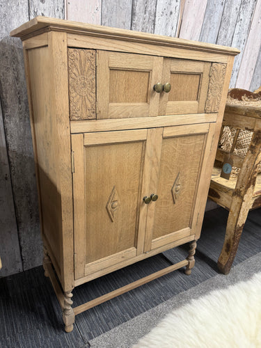 This beautiful oak cupboard has been fully stripped to reveal its natural finish and could benefit from a coat of wax to keep it protected. It offers plenty of storage, featuring a hinged top that lifts to reveal a spacious compartment, plus a double cupboard at the base with one shelf inside. Although it’s a used piece with some minor marks, these do not detract from its charm.

Overall Dimensions

74cm wide x 37cm deep x 108cm high

DELIVERY AVAILABLE      

For our other items see our website https://fos