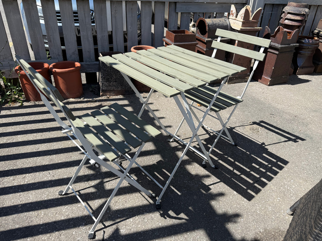 This charming sage green patio set is sturdy and well-maintained. While it shows some signs of use, the marks are minor and don’t detract from its appeal. Both the chairs and table fold up for convenient storage, making it perfect for any outdoor space.

Overall Dimensions

table dimensions : 54cm wide x 55cm deep x 71cm high

DELIVERY AVAILABLE      

For our other items see our website https://fossewayfurniture.co.uk

collection from our shop at cv36, our collection zone at bs36 or otherwise delivery is a