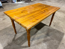 Load image into Gallery viewer, A well-built solid pine dining table that's ready for everyday use. This piece shows its age with minor surface marks, but remains structurally solid and fully functional. It accommodates 4-6 diners comfortably, making it ideal for family meals and gatherings. The removable legs make transport and rearrangement straightforward, adding practical value to this honest, hardwearing table.

Delivery Available

Overall Dimensions

140cm long x 85cm wide x 75.5cm high
