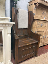 Load image into Gallery viewer, A charming solid pine lambing chair with authentic character. Structurally sound and in good condition, this vintage piece bears gentle signs of use that add to its rustic appeal. Ideal for a hallway, dining room, or any space needing a touch of traditional farmhouse style. A practical and characterful seating solution with genuine heritage.

Delivery Available

Overall Dimensions

69cm wide x 47cm deep x 122cm high

