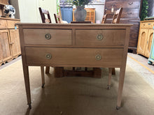 Load image into Gallery viewer, This beautiful stripped oak chest has traditional dovetail joinery throughout. The unfinished surface reveals the wood's natural character and grain, offering you complete creative control over the final aesthetic—apply wax, oil, stain, or paint to suit your décor. Comprising two compact drawers over one spacious drawer, this piece provides versatile storage for any room. Light surface marks enhance its authentic appeal and will respond well to light sanding.&nbsp;

Delivery Available

Overall Dimensions

9
