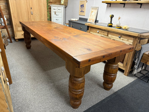 This beautiful chunky 9ft solid pine dining table is sturdy and well-maintained. While it has some minor marks on the surface, they can be easily refreshed with a polish or light sanding. Comfortable seating for 12 makes it ideal for big family meals. Plus, the tabletop detaches from the base to make moving hassle-free. It’s a wonderful choice for joyful family celebrations.

Delivery Available

Overall Dimensions

280cm long x 89cm wide x 77.5cm high
