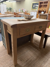 Load image into Gallery viewer, A timeless oak console table with authentic character. Stripped to reveal natural grain, this piece invites subtle finishing to suit your décor. Two dovetail-jointed drawers provide discreet storage for hallway essentials or living room. Structurally sound and ready to become a focal point in your home.

Delivery Available

Overall Dimensions

100cm wide x 46cm deep x 85cm high

