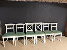 Load image into Gallery viewer, A collection of 6 IKEA dining chairs in good structural condition. This combination comprises a matching set of 4 and a complementary pair of 2, ideal for flexible seating arrangements. Minor surface marks reflect genuine use, while the chairs remain fully functional and ready for your dining space. Perfect for families, entertaining, or creating additional seating options without the cost of new furniture.

Delivery Available

Overall Dimensions

approx : 43cm wide x 44cm deep x 92cm high

