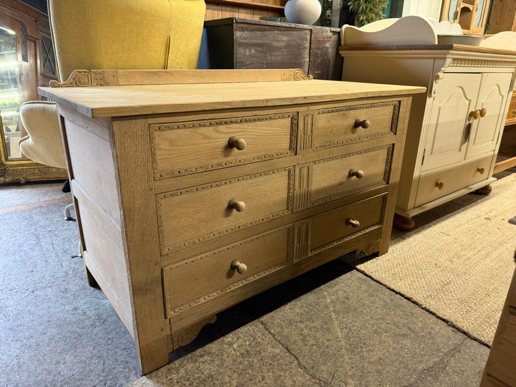 Crafted from solid oak and lovingly stripped to reveal its beautiful natural grain, this charming six-drawer chest is ready for your personal touch. Each drawer features traditional dovetail joinery for durability and smooth operation. A light wax finish will enhance and protect the wood, making it a gorgeous focal point in any room. Perfect for adding warmth and character to your home.

Overall Dimensions

123.5cm wide x 60.5cm deep x 77cm high

DELIVERY AVAILABLE      

For our other items see our website