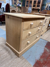 Load image into Gallery viewer, Authentic solid pine chest of drawers, stripped to bare wood and ready for your finishing touch. Features two short dovetail-jointed drawers above two spacious long drawers, offering practical storage with traditional craftsmanship. The natural wood finish showcases beautiful grain patterns. Minor cosmetic wear to the rear top edge does not impact functionality. A protective wax coat is recommended to enhance and preserve the wood.

Delivery Available

Overall Dimensions

96cm wide x 48cm deep x 77cm high&amp;n
