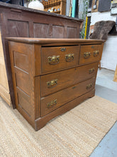 Load image into Gallery viewer, A charming Victorian oak chest featuring practical storage with two compact drawers above two spacious ones. Crafted from oak, this piece showcases period character with the patina of age. While it bears minor surface marks consistent with its vintage heritage, the structure remains sound and fully functional. An excellent addition to period homes or those seeking antique furniture with real character and durability.

Delivery Available

Overall Dimensions

102cm wide x 45cm deep x 76cm high

