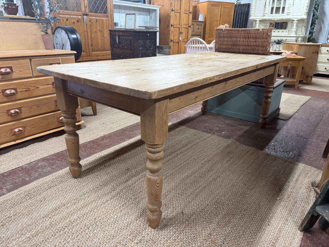 Expertly crafted with sturdy, solid pine, this dining table is built to last. While it may show signs of use, it remains in great condition. With ample seating for 8-10 people, this table is perfect for hosting dinner parties or family gatherings. Plus, the legs are securely attached for added peace of mind.

Overall Dimensions

209cm long x 90cm wide x 77cm high

DELIVERY AVAILABLE      

HAVE THIS PAINTED A COLOUR OF YOUR CHOICE FOR AN EXTRA £125 OR HAVE IT COMPLETELY STRIPPED BACK FOR JUST £150    

For 