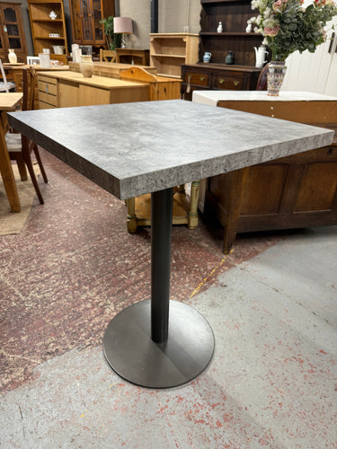 This sturdy bar table features a heavy concrete effect and is in good overall condition. Though it shows some signs of use, the marks are minor. It’s an ideal choice for those looking to save space without compromising style.

Delivery Available

Overall Dimensions

70cm wide x 70cm deep x 92cm high 
