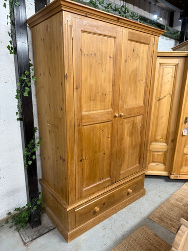 This beautiful solid pine wardrobe is sturdy and well-maintained. While it shows some signs of use with a few scratches, these can easily be refreshed with a bit of paint. It offers plenty of storage space, featuring a hanging rail and a dovetail jointed drawer. Plus, it can be dismantled for convenient moving.

Overall Dimensions

122cm wide x 63cm deep x 191cm high

DELIVERY AVAILABLE      

HAVE THIS PAINTED A COLOUR OF YOUR CHOICE FOR AN EXTRA £100 OR HAVE IT COMPLETELY STRIPPED BACK FOR JUST £120    

