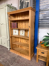Load image into Gallery viewer, Solid pine construction built to last, this practical bookcase features four adjustable removable shelves to accommodate books, décor, and everyday essentials. Structurally sound with only minor cosmetic marks, it's an ideal solution for home offices, living rooms, or study spaces where reliable storage meets understated style.

Delivery Available

Overall Dimensions

96cm wide x 33cm deep x 152.5cm high

