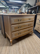 Load image into Gallery viewer, Elegant French Louis XV style chest of drawers by Olympus featuring three spacious long drawers for generous storage. Structurally sound and in great condition, this piece brings authentic charm to any bedroom or living space. Ideal for those seeking timeless French provincial elegance with practical functionality.

Delivery Available

Overall Dimensions

92cm wide x 44.5cm deep x 76cm high&nbsp;

