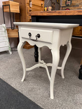 Load image into Gallery viewer, A classic French-style side table with enduring appeal. Built to last, this vintage piece remains in sound condition with only minor cosmetic wear that reflects its history. The single drawer provides convenient storage space. An elegant addition to traditional or eclectic interiors.

Delivery Available

Overall Dimensions

51cm wide x 41cm deep x 67cm high

