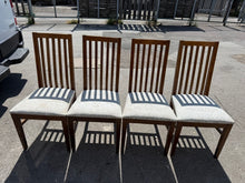 Load image into Gallery viewer, This cheerful set includes four sturdy wooden dining chairs, all in good shape. While the frames show some minor marks and the seats might benefit from a quick clean, overall they’re ready to brighten up your dining space.

Overall Dimensions

approx : 47cm wide x 47cm deep x 98cm high

DELIVERY AVAILABLE      

For our other items see our website https://fossewayfurniture.co.uk

collection from our shop at cv36, our collection zone at bs36 or otherwise delivery is available

