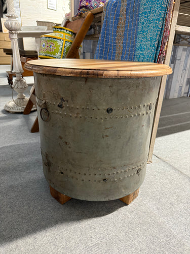 Bring raw, authentic character to your space with this striking industrial side table. Crafted from sturdy galvanised iron and topped with warm wood, it combines durability with rustic charm. Imported from India, this piece showcases craftsmanship and promises to become a standout feature in any room, adding personality and edge to your interior design.

Overall Dimensions

52cm diameter x 51.5cm high

DELIVERY AVAILABLE      

For our other items see our website https://fossewayfurniture.co.uk

collection 
