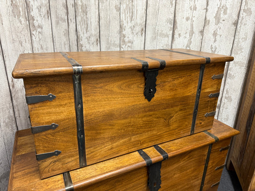 This beautiful solid wooden trunk is sturdy and well-made. It’s brand new, showing only a few minor marks from transport. The lid opens easily to reveal plenty of storage space inside. It has handles on each side for easier moving.

Delivery Available

Overall Dimensions

83cm wide x 34cm deep x 37cm high

