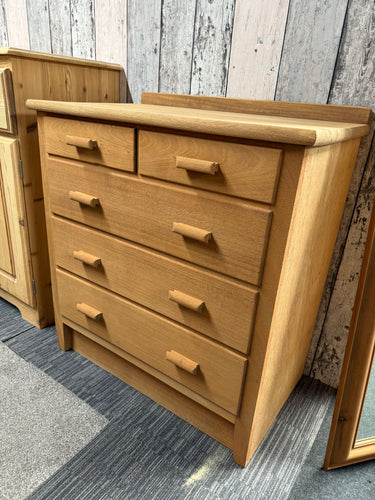 This beautiful mid-20th century chest of drawers is solidly built and well-preserved. It has been fully stripped down to its natural, untouched wood, so applying a wax finish might be needed for protection. Featuring two small dovetail-jointed drawers above three larger ones, it offers ample storage space.

Overall Dimensions

71cm wide x 43cm deep x 79cm high

DELIVERY AVAILABLE      

For our other items see our website https://fossewayfurniture.co.uk

collection from our shop at cv36, our collection zone