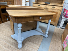 Load image into Gallery viewer, This charming mahogany hall table / washstand is sturdy and well-preserved. Having been refreshed by previous owners, it might benefit from a little touch-up here and there. Featuring one drawer and a lower shelf, it offers practical storage with a delightful vintage appeal.

Overall Dimensions

104cm wide x 52.5cm deep x 75cm high

DELIVERY AVAILABLE      

For our other items see our website https://fossewayfurniture.co.uk

collection from our shop at CV36 4QZ or purchase online for delivery.

