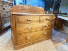 Load image into Gallery viewer, A charming vintage pine chest of drawers with authentic character and solid construction. This piece features a classic 2-over-2 drawer configuration—two shallow drawers above two spacious deep drawers—offering practical storage for any room. Well-maintained and structurally sound, it shows pleasing signs of age with minor surface marks that add to its vintage appeal. Perfect for adding warmth and period charm to bedrooms, living spaces, or hallways.

Delivery Available

Overall Dimensions

115cm wide x 48c
