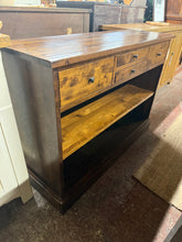 Load image into Gallery viewer, A charming Laura Ashley hall table that combines practicality with timeless style. This pre-loved piece remains structurally solid and well-maintained, with only minor marks. The thoughtful design features two spacious drawers, two smaller drawers, and a shelf beneath—offering generous storage for hallway essentials, from keys and post to decorative accessories.&nbsp;

Delivery Available

Overall Dimensions

110cm wide x 36.5cm deep x 80cm high&nbsp;

