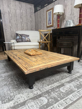 Load image into Gallery viewer, A spacious wooden coffee table that combines practicality with understated elegance. Built to last with solid construction, this piece shows only minor cosmetic marks that speak to its authentic character. Its lightweight design makes repositioning effortless, while the generous surface area provides ample space for drinks, books, and décor. An ideal centrepiece for any living room seeking both function and style.

Delivery Available

Overall Dimensions

157cm long x 91cm wide x 27cm high

