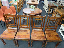 Load image into Gallery viewer, A charming set of 4 mango wood dining chairs, structurally sound and ready for your home. These pre-loved pieces show honest signs of use with minor marks and surface wear that a gentle polish will easily diminish. Ideal for adding warmth and character to your dining space.

Delivery Available

Overall Dimensions

approx : 45cm wide x 45cm deep x 101cm high&nbsp;&nbsp;

