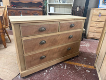 Load image into Gallery viewer, A stripped satinwood chest showcasing the wood's natural finish and authentic character. Two short dovetail-jointed drawers sit above two long ones, delivering practical storage. The construction is solid and reliable, with the piece in excellent working order. A light wax treatment will enhance and protect the exposed wood surface. Ideal for those appreciating genuine craftsmanship and the understated elegance of natural satinwood.

Delivery Available

Overall Dimensions

114cm wide x 45cm deep x 79.5cm hi
