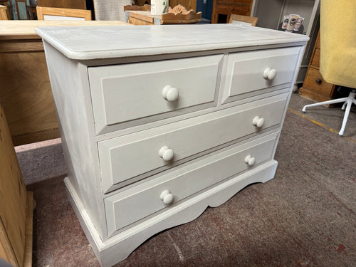 This beautiful solid pine chest of drawers has been painted white by its previous owners and might benefit from a little touch-up here and there. It includes two small dovetail jointed drawers above two larger ones, providing ample storage.

Overall Dimensions

102cm wide x 45.5cm deep x 79cm high

DELIVERY AVAILABLE      

HAVE THIS PAINTED A COLOUR OF YOUR CHOICE FOR AN EXTRA £80 OR HAVE IT COMPLETELY STRIPPED BACK FOR JUST £95    

For our other items see our website https://fossewayfurniture.co.uk

coll