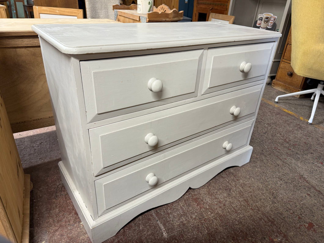 This beautiful solid pine chest of drawers has been painted white by its previous owners and might benefit from a little touch-up here and there. It includes two small dovetail jointed drawers above two larger ones, providing ample storage.

Overall Dimensions

102cm wide x 45.5cm deep x 79cm high

DELIVERY AVAILABLE      

HAVE THIS PAINTED A COLOUR OF YOUR CHOICE FOR AN EXTRA £80 OR HAVE IT COMPLETELY STRIPPED BACK FOR JUST £95    

For our other items see our website https://fossewayfurniture.co.uk

coll