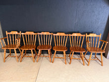 Load image into Gallery viewer, A charming set of six pine dining chairs, comprising four upright chairs and two carver chairs. Each piece is structurally sound and ready for everyday use. As used items, they bear the natural patina of age with minor surface marks that add character rather than detract from their appeal. Ideal for those seeking well-made dining furniture with charm.

Delivery Available

Overall Dimensions

Upright approx: 44cm wide x 43cm deep x 81.5cm high

