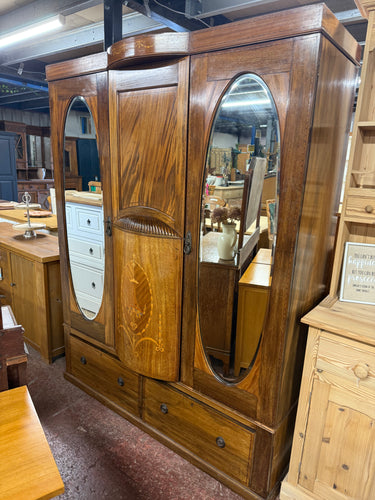 This beautiful mahogany Edwardian wardrobe is solidly built and well-preserved. While it shows some signs of use, the marks are minor and do not detract from its charm. It offers generous storage space with two hanging rails and two long drawers featuring dovetail joints. For convenience, it breaks down into four sections, making it easier to move.

Overall Dimensions

146cm wide x 51cm deep x 191cm high

DELIVERY AVAILABLE      

For our other items see our website https://fossewayfurniture.co.uk

collecti