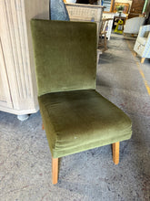 Load image into Gallery viewer, This charming emerald green bedroom chair combines style with practicality. Structurally sound and in good condition, it bears the gentle patina of gentle use with only minor surface marks. The rich green hue adds instant character and warmth to any bedroom, creating a focal point that complements both modern and traditional décor. An affordable way to introduce colour and comfort to your space.

Delivery Available

Overall Dimensions

44cm wide x 50cm deep x 76cm high

