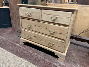Expertly crafted from solid pine, this chest of drawers has been carefully stripped down to its natural state, allowing for a protective wax coating if desired. Despite its previous use, this piece may contain minor marks, but nothing that takes away from its functionality. With two short dovetail jointed drawers above two spacious long drawers, it offers ample storage space without sacrificing style.

Overall Dimensions

91cm wide x 47.5cm deep x 76cm high

DELIVERY AVAILABLE      

For our other items see