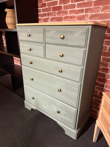 This beautiful solid pine chest of drawers is finished in Frenchic's 'Steaming Green,' with the top sanded and sealed with clear wax. It provides plenty of storage with four small drawers and three large ones. Plus, it features wheels for effortless mobility.

Overall Dimensions

87cm wide x 44.5cm deep x 115cm high to top of unit not backboard

DELIVERY AVAILABLE      

For our other items see our website https://fossewayfurniture.co.uk

collection from our shop at CV36 4QZ or purchase online for delivery.