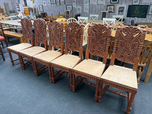 This stunning set of six Indian hardwood dining chairs features beautifully intricate carvings on each piece, adding a unique touch of craftsmanship to your dining area. All chairs are in overall good condition. While the seats are made from plywood, this design detail offers a great opportunity to customise with your preferred seat pads, enhancing both comfort and style to suit your décor.

Overall Dimensions

approx : 46cm wide x 47cm deep x 116cm high

DELIVERY AVAILABLE      

For our other items see ou