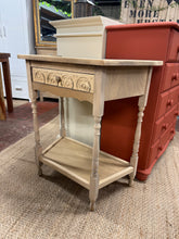 Load image into Gallery viewer, A beautiful stripped oak hall table with authentic character and solid construction. Features a dovetail jointed drawer and lower shelf, ideal for entryway storage and display. The natural wood finish may benefit from a protective wax coat. Structurally sound and in overall good condition minus some wear to one corner.

Delivery Available

Overall Dimensions

71cm wide x 39cm deep x 76cm high

