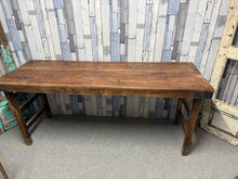 Load image into Gallery viewer, This authentic Indian folding table combines practical design with solid hardwood construction. Imported directly from India, it features sturdy legs that collapse neatly for convenient storage and transport. Whether you need a dining surface, workspace, or flexible furniture solution, this versatile piece adapts to your needs. Built to last with reliable craftsmanship and a well-maintained finish.

Delivery Available

Overall Dimensions

175cm wide x 59cm deep x 76cm high
