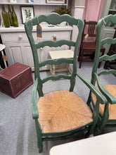 Load image into Gallery viewer, A charming rustic dining chair finished in Farrow &amp; Ball's 'Beverly'—a soft, sophisticated colour that complements any interior. The light distressed paint enhances its character, revealing hints of the wood beneath. Structurally sound and well-maintained, this carver offers both comfort and timeless style for your dining space.

Delivery Available

Overall Dimensions

approx : 53cm wide x 111cm high and 36cm seat height

