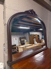 Load image into Gallery viewer, This elegant mahogany over mantle mirror combines timeless style with practical functionality. The sturdy frame is in good condition, with only minor surface marks that add character rather than detract from its appeal. Ideal for creating a focal point above your fireplace, it brings warmth and sophistication to any living space. A versatile piece that complements both traditional and contemporary interiors.

Delivery Available

Overall Dimensions

112cm wide x 91cm high

