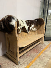 Load image into Gallery viewer, Authentic stripped pine pew with natural grain character and warm patina. Practical for dining areas, hallways, or period-style interiors. The bare wood finish showcases genuine pitch pine beauty—consider applying protective wax to enhance longevity and lustre. A versatile, characterful addition to traditional or eclectic spaces.

Delivery Available

Overall Dimensions

136cm wide x 45cm deep x 94cm high&nbsp;

